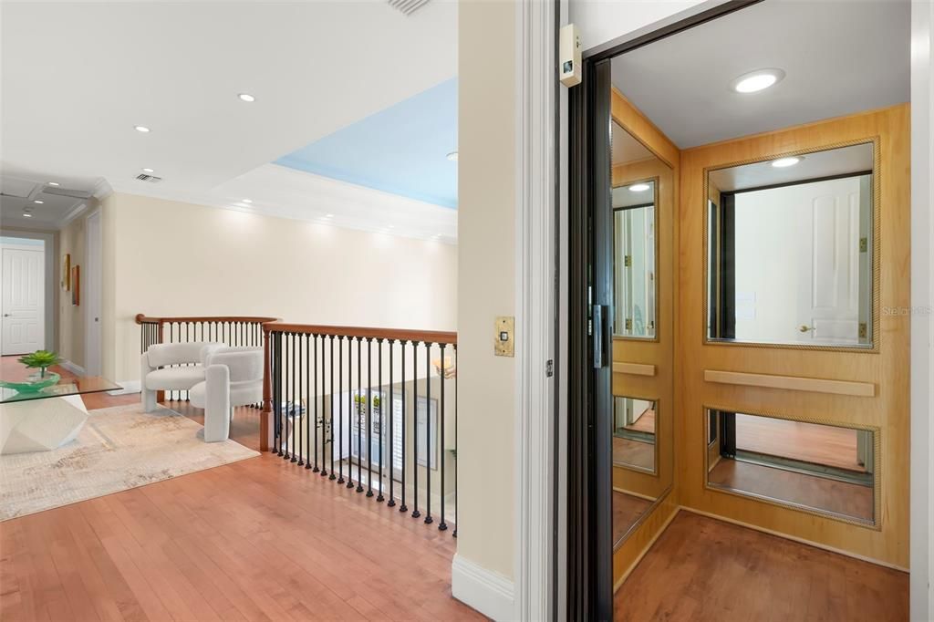 Elevator, Interior, Recessed Lighting, Wood Texture Flooring, Wooden Walls