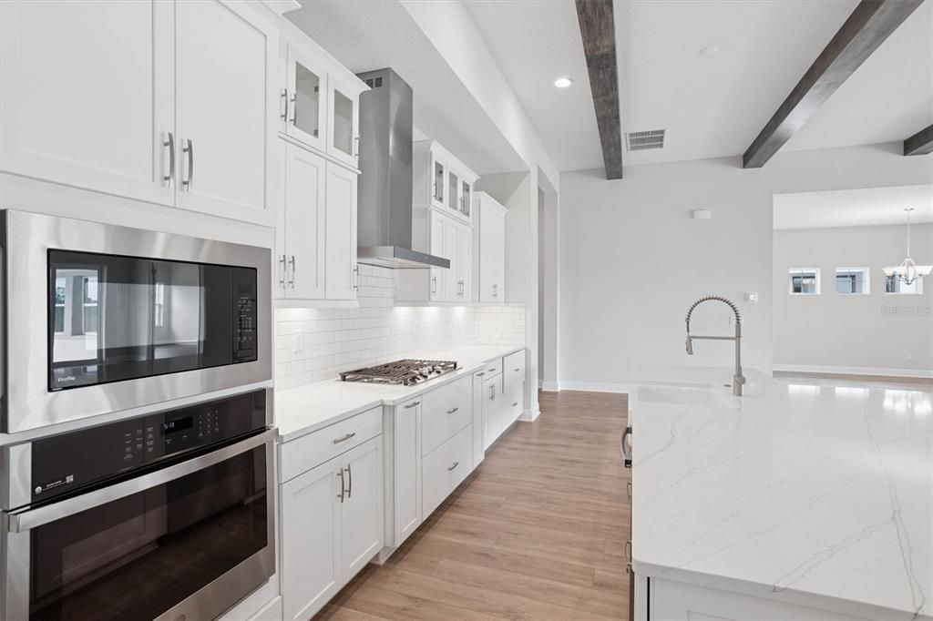 Interior, Kitchen, Pendant Lights, Recessed Lighting, Stainless Steel Appliances, Wooden Beams, Wood Texture Flooring