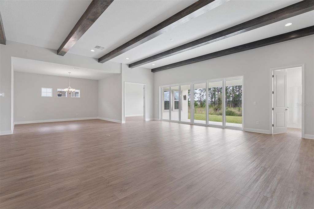 Chandelier, Empty room, Interior, Recessed Lighting, Wooden Beams, Wood Texture Flooring