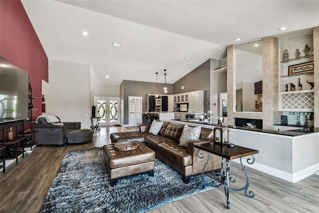 Fireplace, Interior, Kitchen, Living room, Pendant Lights, Recessed Lighting, Wood Texture Flooring