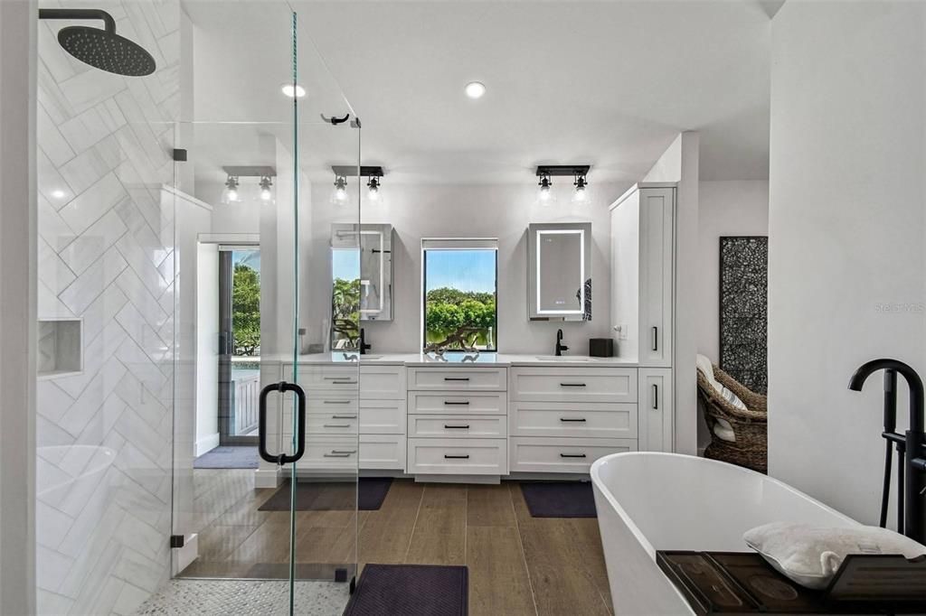Bathroom, Dual Sink Vanities, Free Standing Baths, Glass Shower, Interior, Recessed Lighting, Wood Texture Flooring