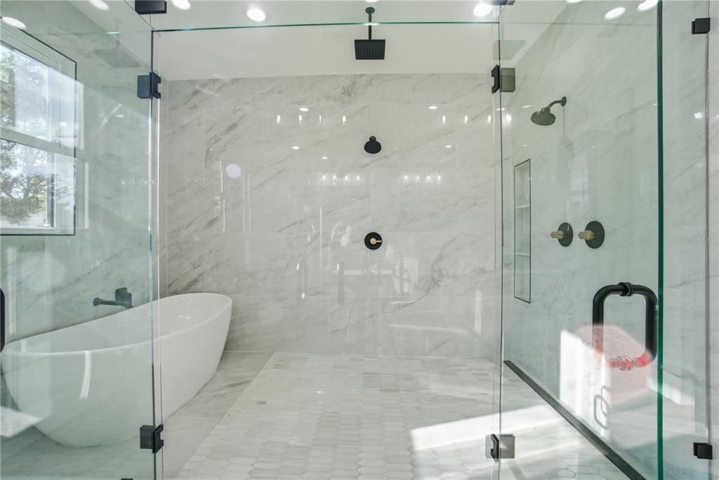 Bathroom, Free Standing Baths, Glass Shower, Interior, Marble Walls, Recessed Lighting