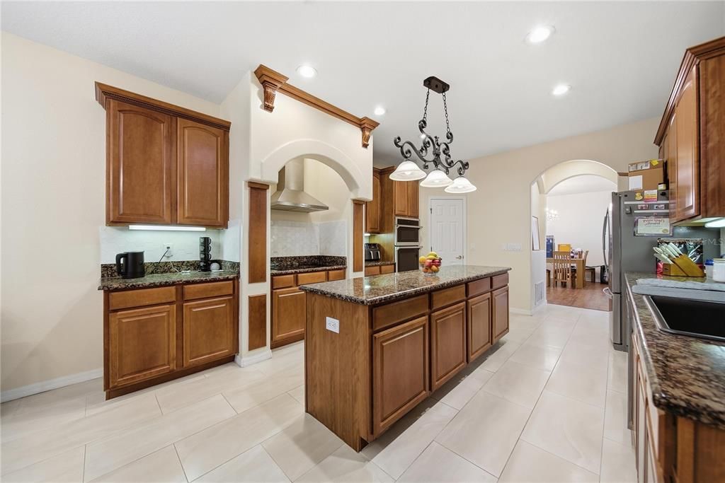 Chandelier, Dining room, Interior, Kitchen, Pendant Lights, Recessed Lighting, Stainless Steel Appliances