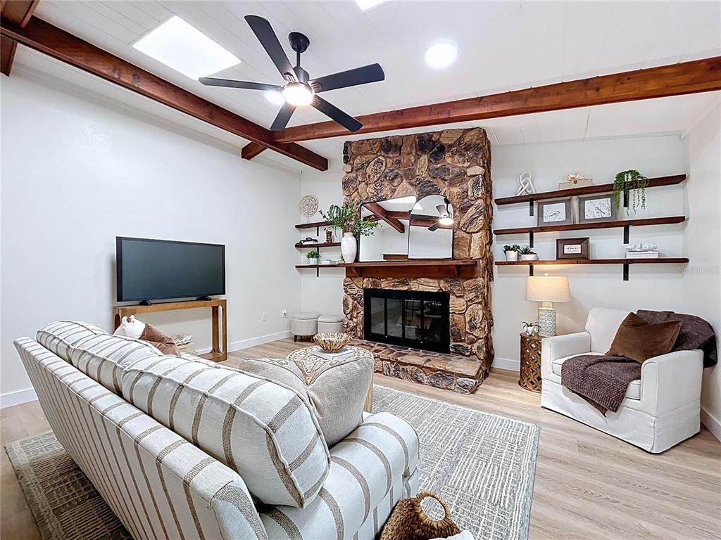 Fireplace, Interior, Living room, Recessed Lighting, Stone Walls, Wooden Beams, Wood Texture Flooring
