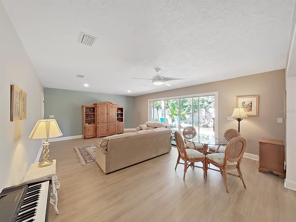 Dining room, Interior, Living room, Piano, Recessed Lighting, Wood Texture Flooring