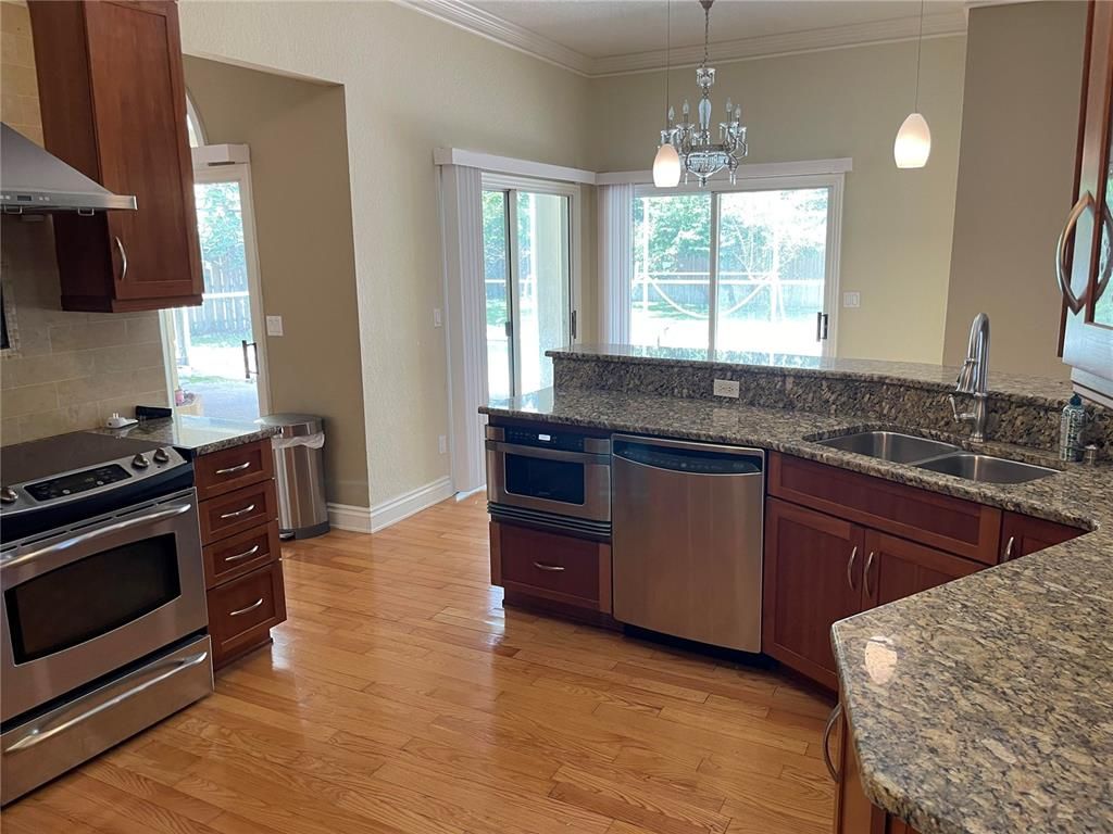 Interior, Kitchen, Pendant Lights, Stainless Steel Appliances, Wood Texture Flooring