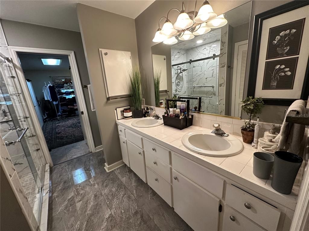 Bathroom, Dual Sink Vanities, Interior, Marble, Marble Walls, Tile Countertops