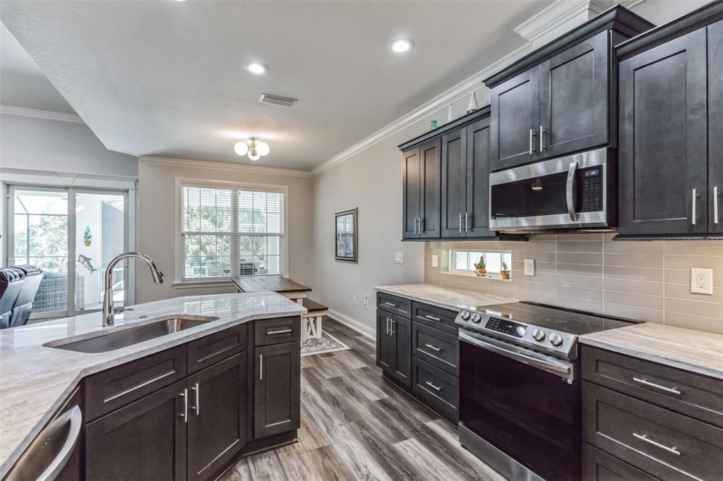 Interior, Kitchen, Recessed Lighting, Stainless Steel Appliances, Wood Texture Flooring