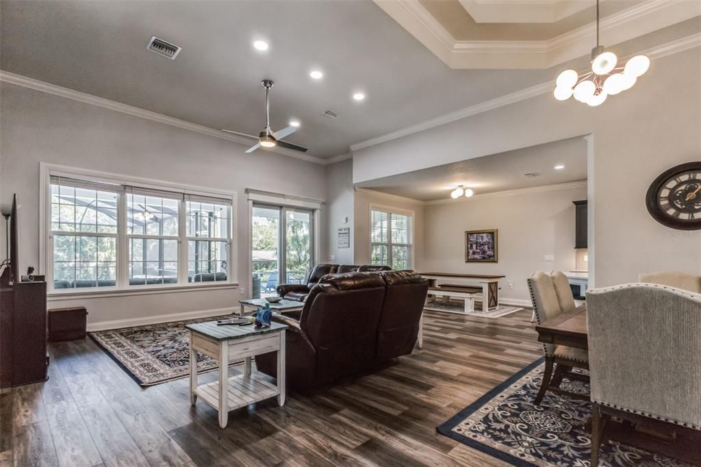 Billiard Table, Dining room, Game Room, Interior, Living room, Pendant Lights, Recessed Lighting, Wood Texture Flooring