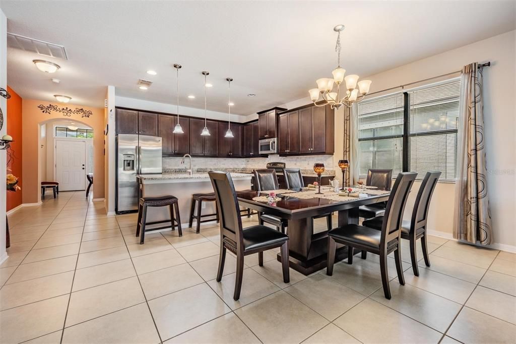 Chandelier, Dining room, Interior, Kitchen, Pendant Lights, Recessed Lighting, Stainless Steel Appliances