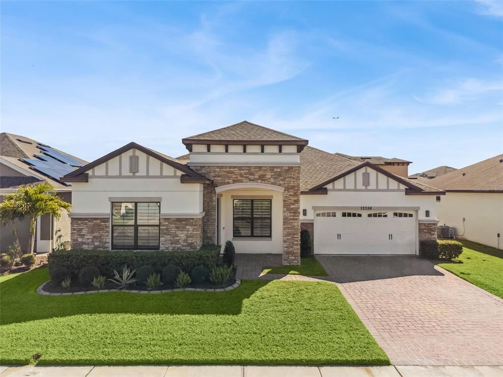 Attached, Exterior, Facade, Brick Traditional