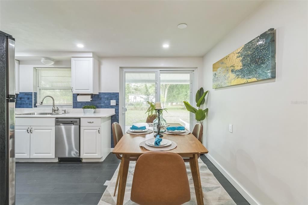 Dining room, Interior, Kitchen, Recessed Lighting, Stainless Steel Appliances, Wood Texture Flooring
