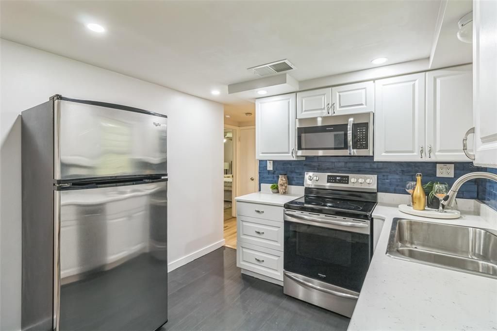 Interior, Kitchen, Recessed Lighting, Stainless Steel Appliances, Wood Texture Flooring