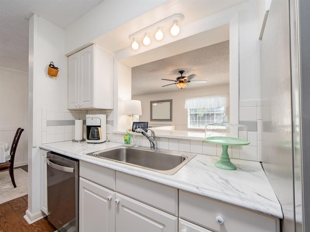 Interior, Kitchen, Tile Countertops, Wood Texture Flooring