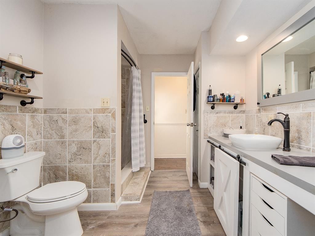 Bathroom, Dual Sink Vanities, Interior, Recessed Lighting, Wood Texture Flooring