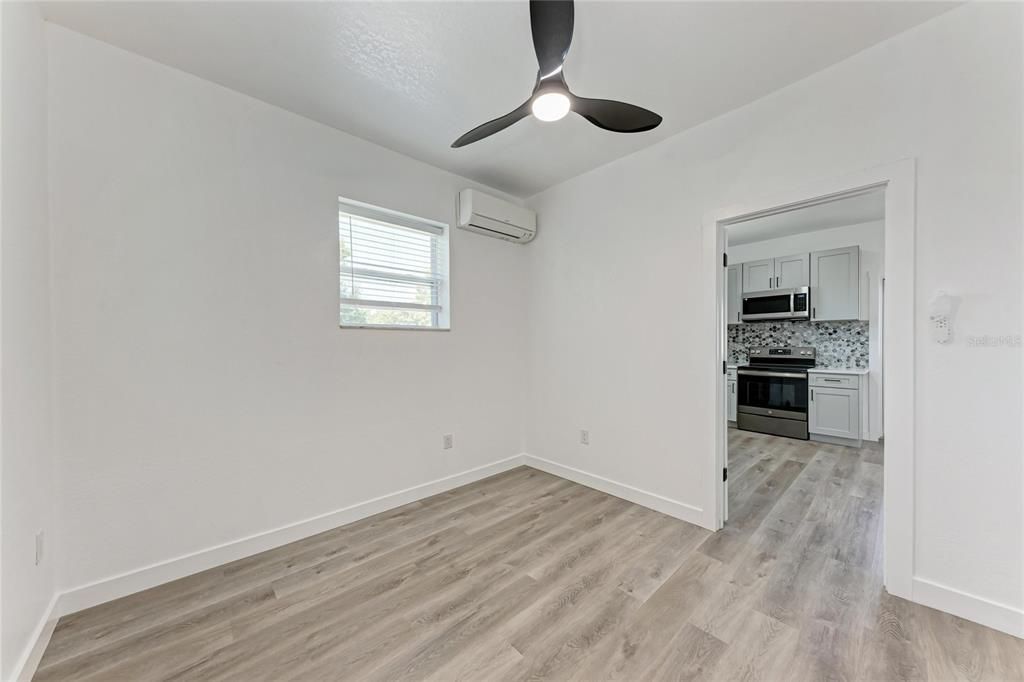 Empty room, Interior, Kitchen, Stainless Steel Appliances, Wood Texture Flooring