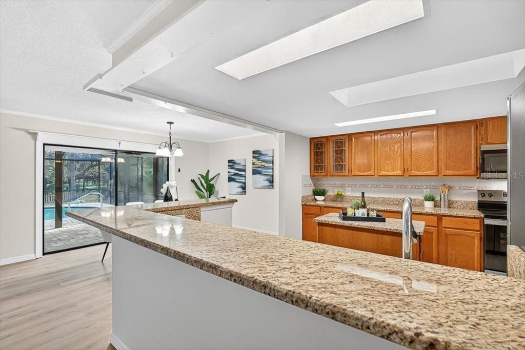 Interior, Kitchen, Pendant Lights, Stainless Steel Appliances, Wood Texture Flooring
