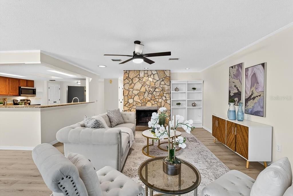 Fireplace, Interior, Kitchen, Living room, Recessed Lighting, Stone Walls, Wood Texture Flooring