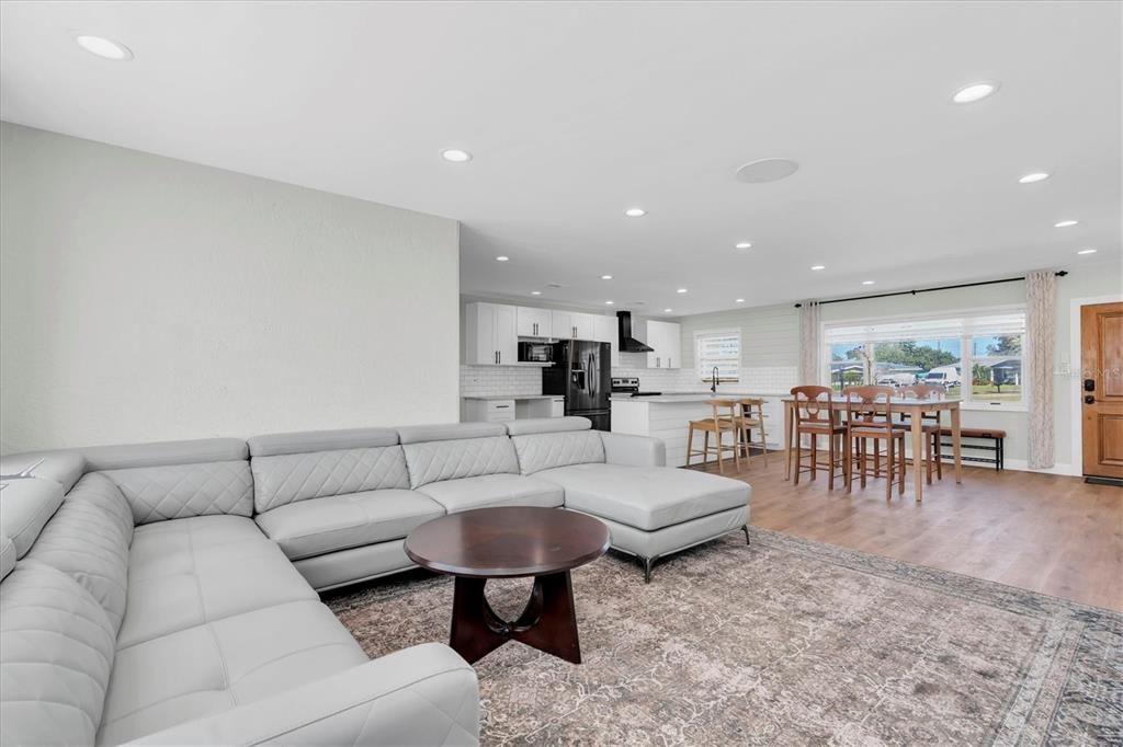 Dining room, Interior, Kitchen, Living room, Recessed Lighting, Stainless Steel Appliances, Wood Texture Flooring