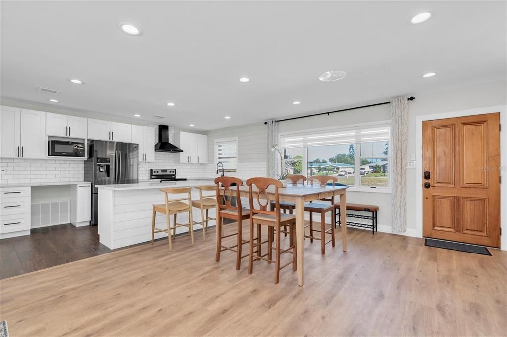 Dining room, Interior, Kitchen, Recessed Lighting, Stainless Steel Appliances, Wood Texture Flooring