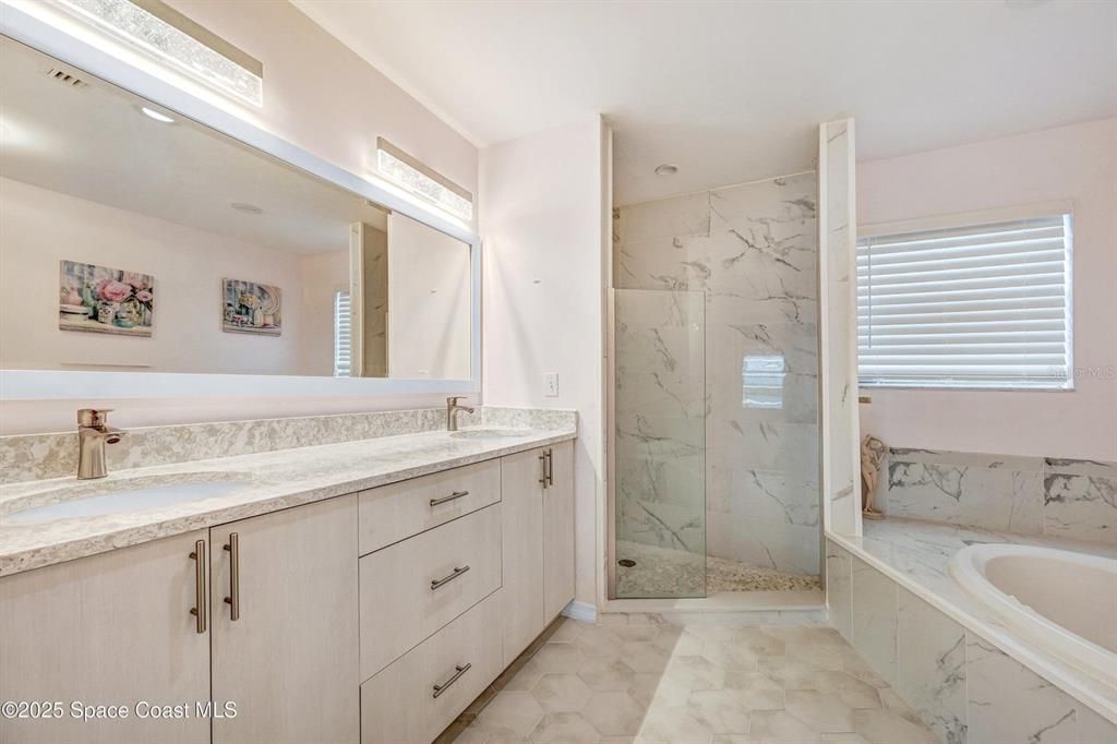 Bathroom, Dual Sink Vanities, Glass Shower, Interior, Marble, Marble Walls, Recessed Lighting
