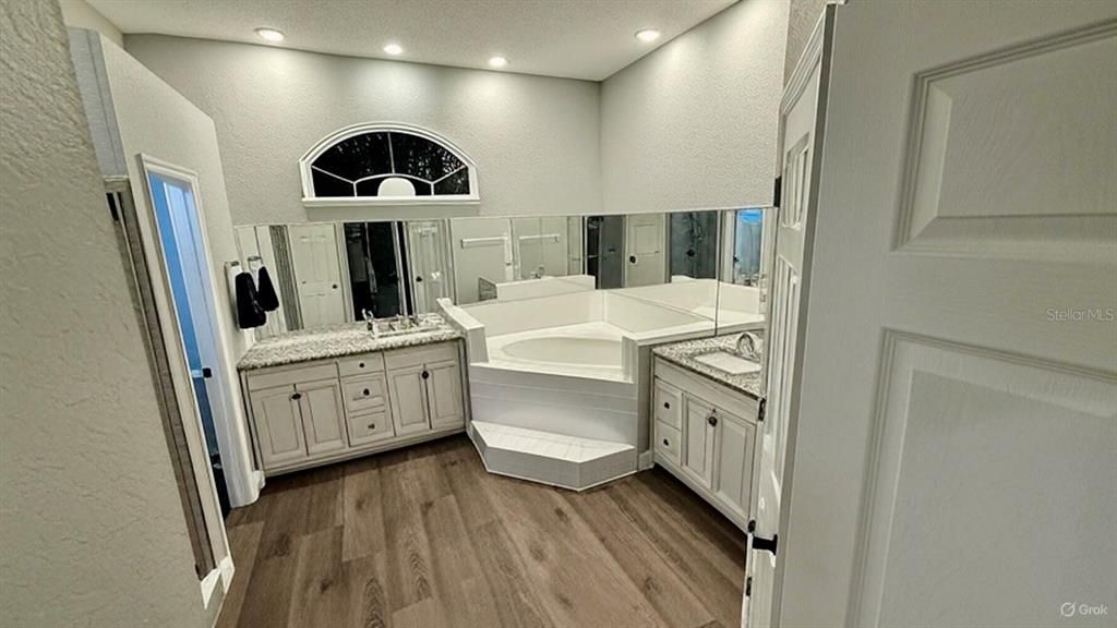 Bathroom, Dual Sink Vanities, Interior, Recessed Lighting, Wood Texture Flooring