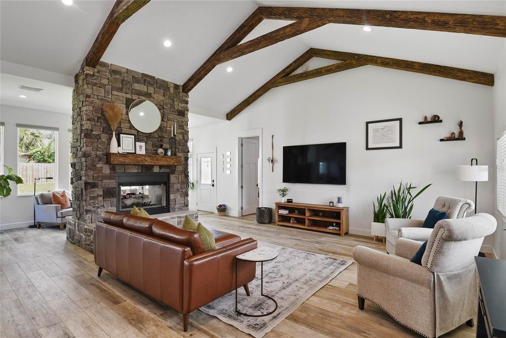 Fireplace, Interior, Living room, Recessed Lighting, Stone Walls, Wooden Beams, Wood Texture Flooring