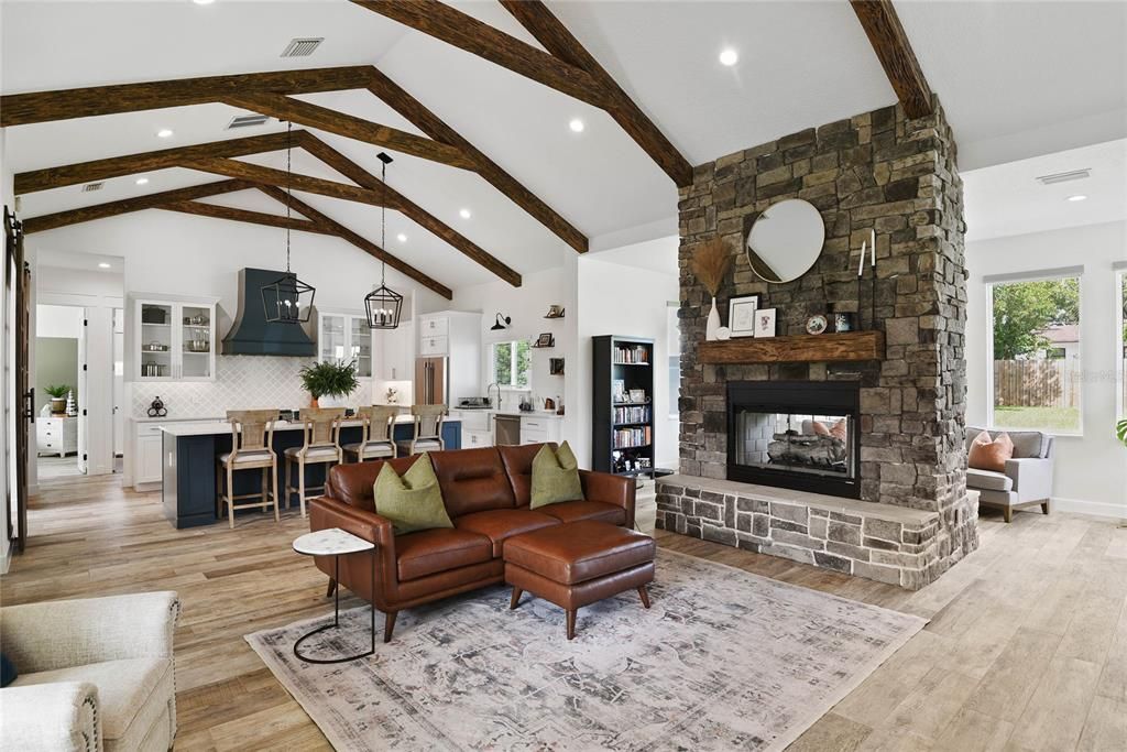 Dining room, Fireplace, Interior, Kitchen, Living room, Pendant Lights, Recessed Lighting, Stone Walls, Wooden Beams, Wood Texture Flooring