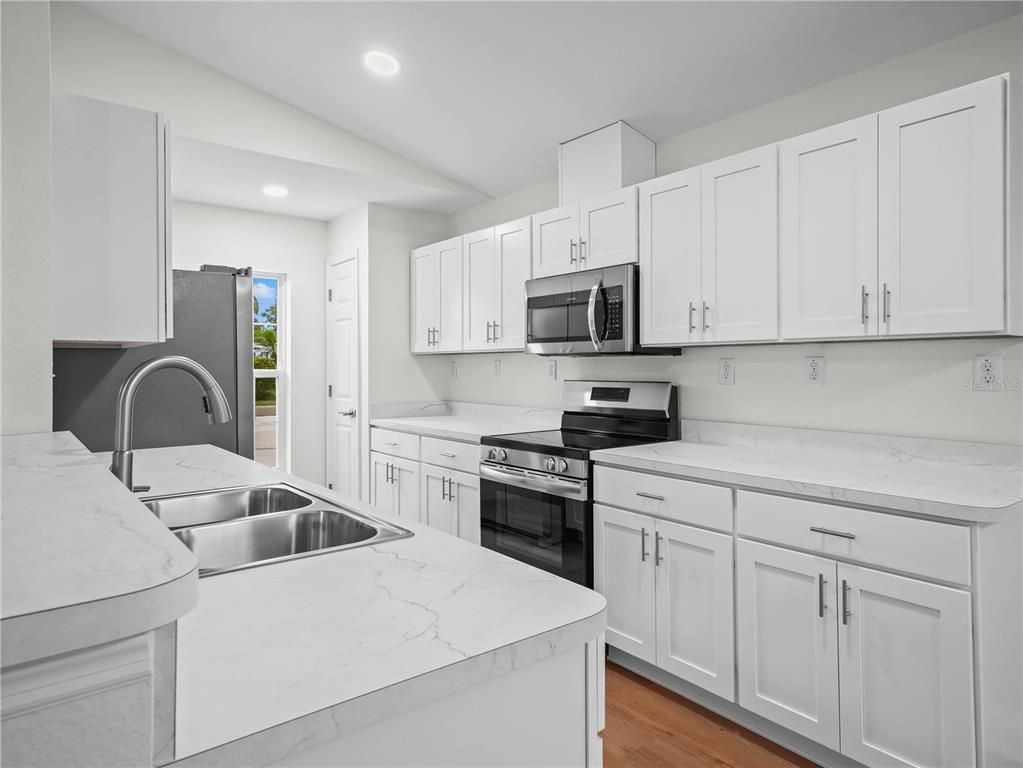 Interior, Kitchen, Recessed Lighting, Stainless Steel Appliances, Wood Texture Flooring