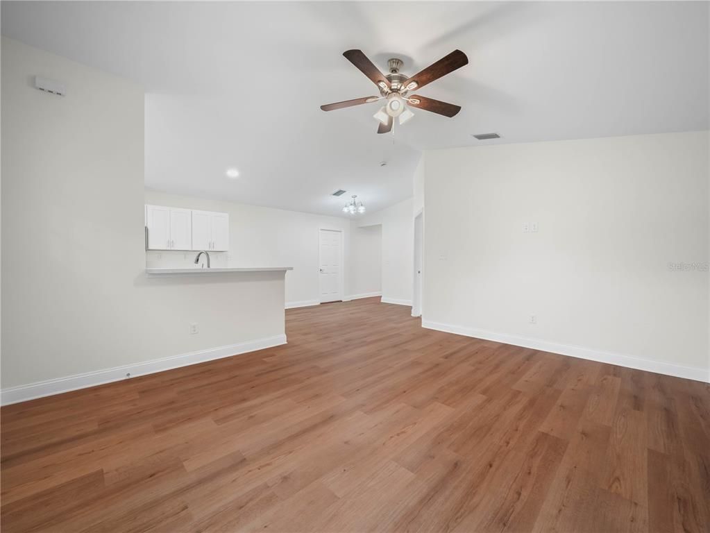 Chandelier, Empty room, Interior, Recessed Lighting, Wood Texture Flooring