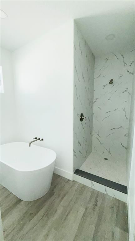 Bathroom, Free Standing Baths, Interior, Marble Walls, Wood Texture Flooring
