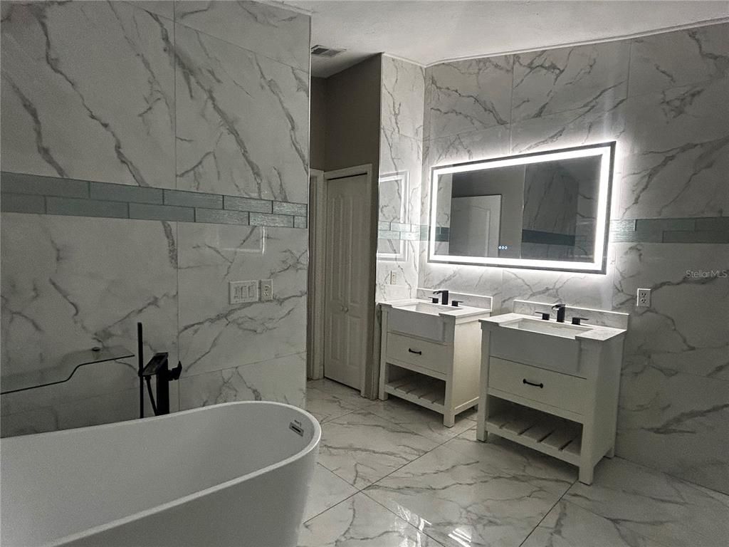 Bathroom, Dual Sink Vanities, Free Standing Baths, Interior, Marble, Marble Walls