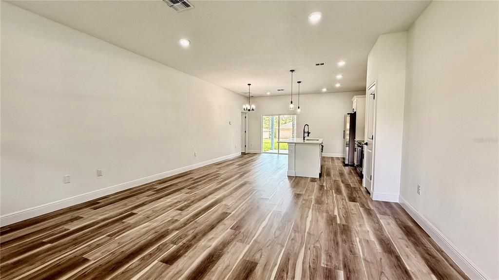 Empty room, Interior, Kitchen, Pendant Lights, Recessed Lighting, Wood Texture Flooring