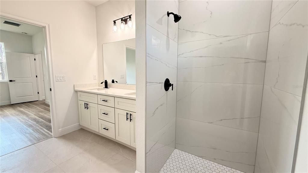 Bathroom, Dual Sink Vanities, Interior, Marble Walls, Wood Texture Flooring