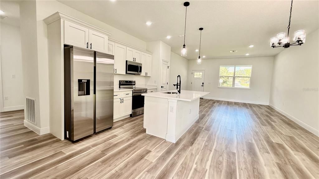 Interior, Kitchen, Pendant Lights, Recessed Lighting, Stainless Steel Appliances, Wood Texture Flooring