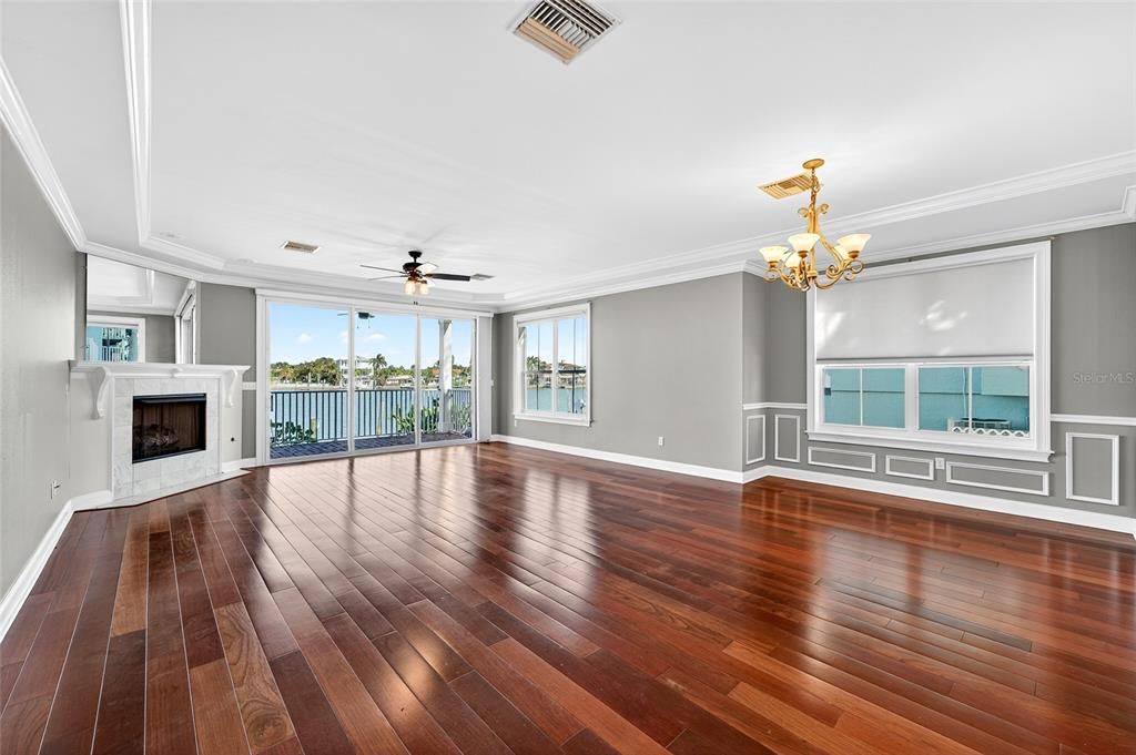 Chandelier, Empty room, Fireplace, Interior, Wood Texture Flooring