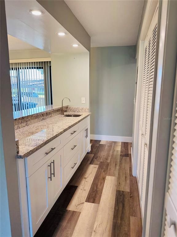 Bathroom, Dual Sink Vanities, Interior, Recessed Lighting, Wood Texture Flooring