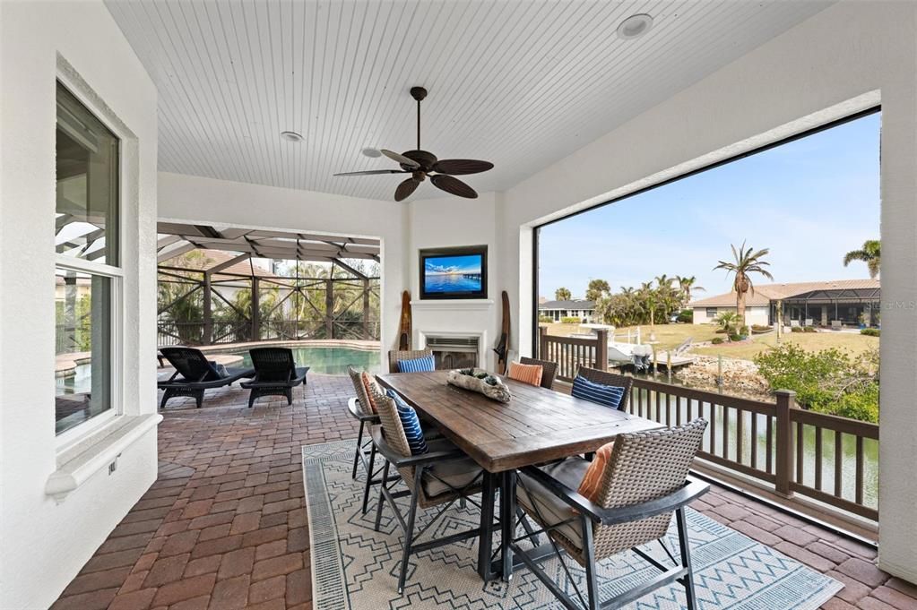 Dining room, Fireplace, Interior, Pool, Sun Room