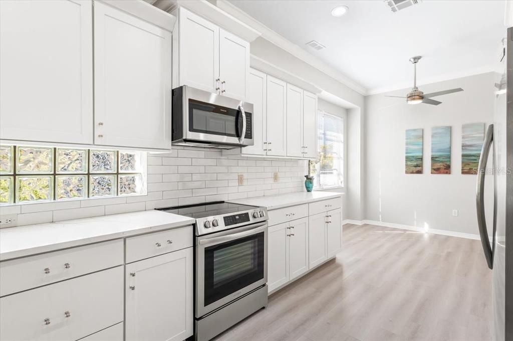 Interior, Kitchen, Recessed Lighting, Stainless Steel Appliances, Wood Texture Flooring
