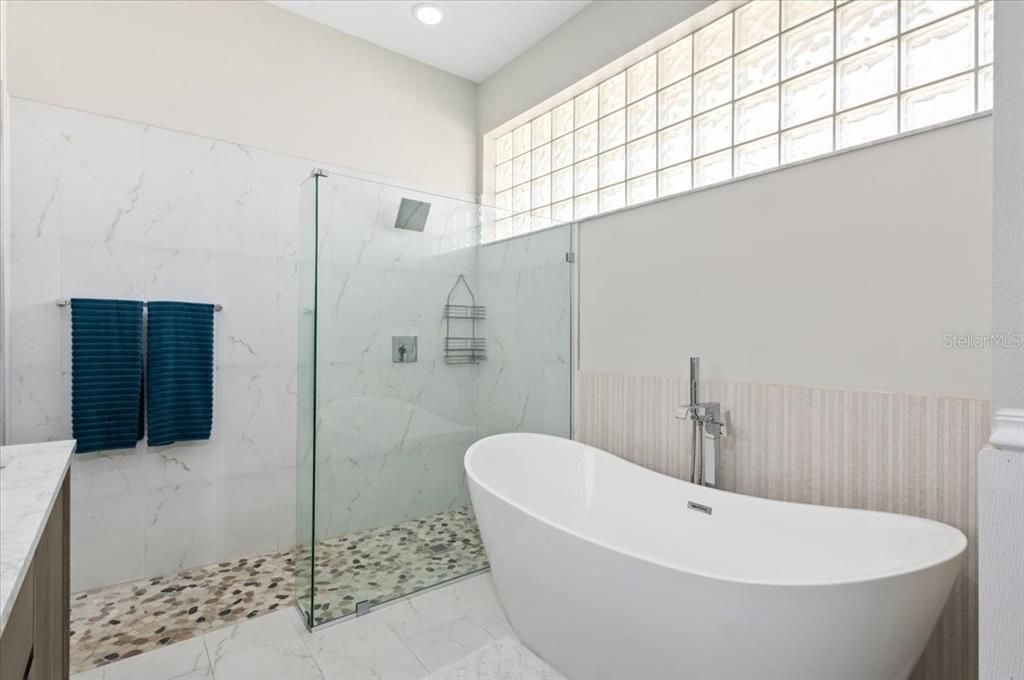 Bathroom, Free Standing Baths, Glass Shower, Interior, Marble, Marble Walls, Recessed Lighting