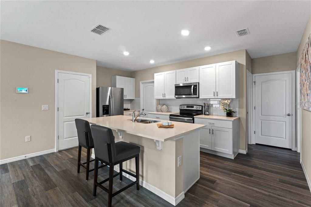 Interior, Kitchen, Recessed Lighting, Stainless Steel Appliances, Wood Texture Flooring