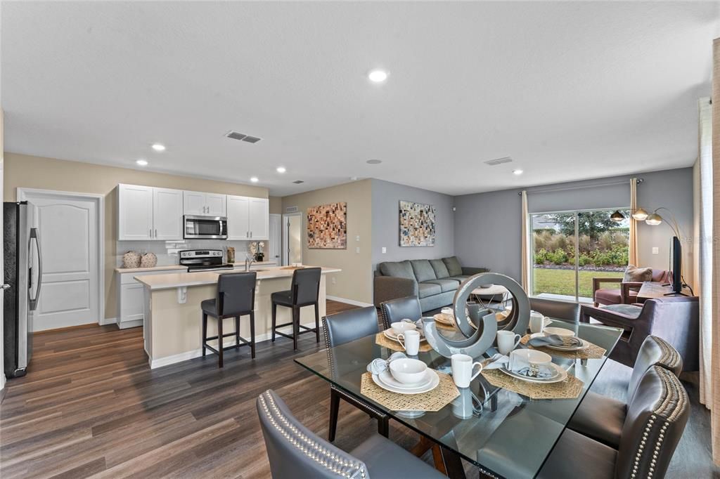Dining room, Interior, Kitchen, Recessed Lighting, Stainless Steel Appliances, Wood Texture Flooring