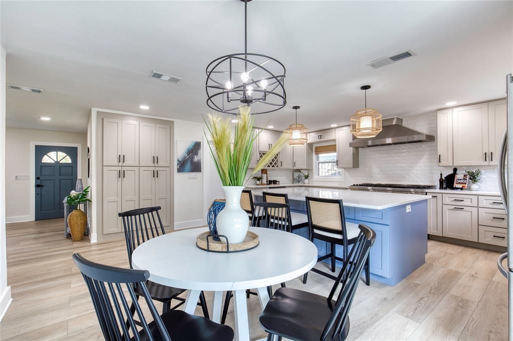 Dining room, Interior, Kitchen, Pendant Lights, Recessed Lighting, Stainless Steel Appliances, Wood Texture Flooring