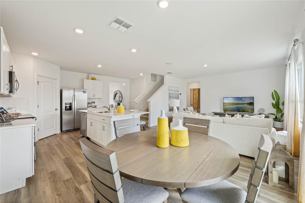 Dining room, Interior, Kitchen, Living room, Pendant Lights, Recessed Lighting, Stainless Steel Appliances, Wood Texture Flooring