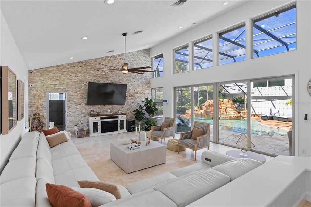 Fireplace, Interior, Living room, Recessed Lighting, Stone Walls, Sun Room