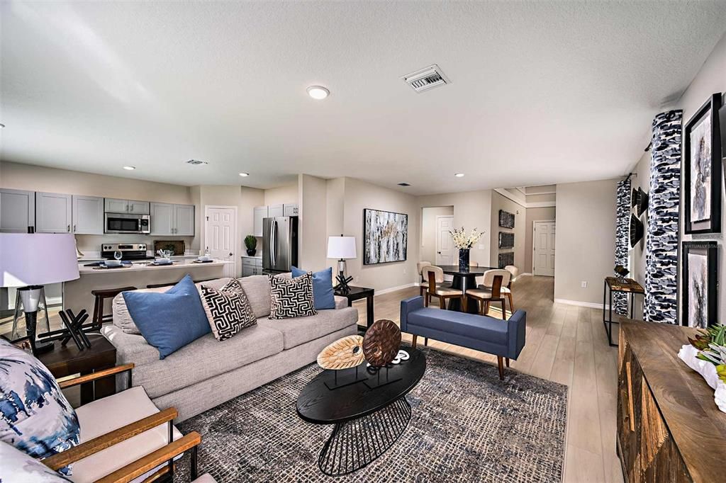 Dining room, Interior, Kitchen, Living room, Recessed Lighting, Stainless Steel Appliances, Wood Texture Flooring