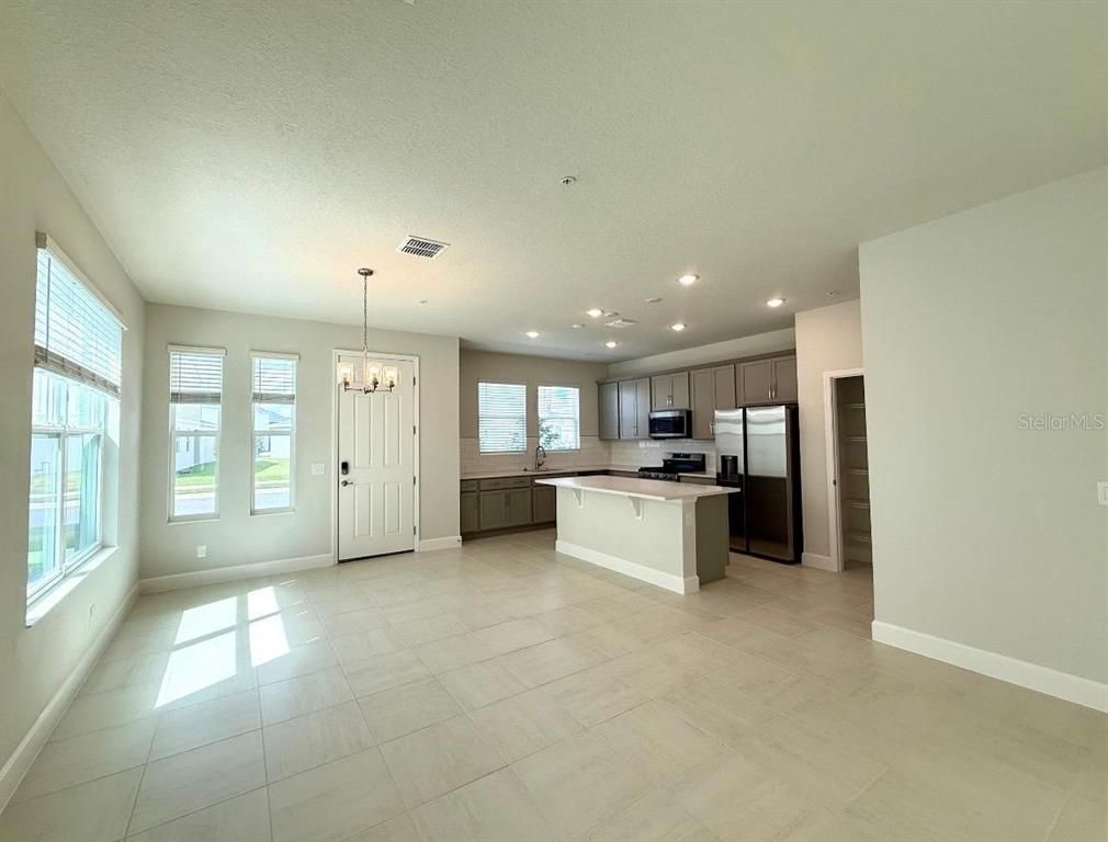Chandelier, Empty room, Interior, Kitchen, Recessed Lighting, Stainless Steel Appliances