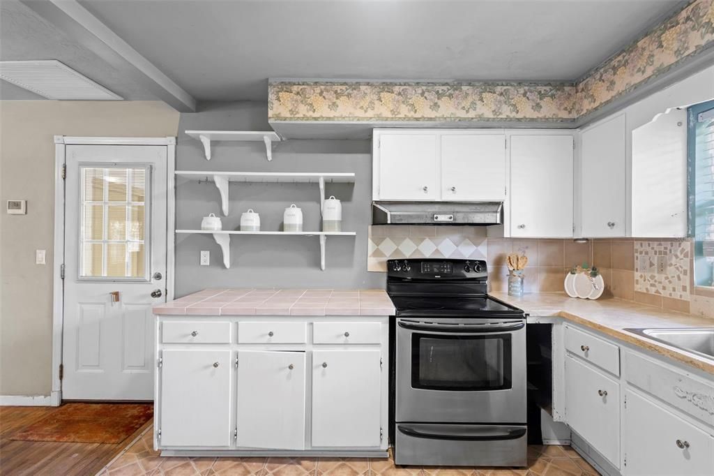 Interior, Kitchen, Tile Countertops, Wood Texture Flooring