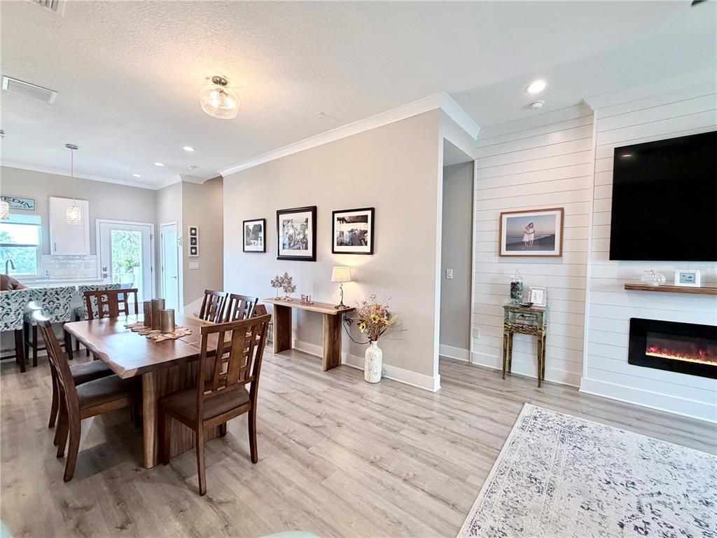 Dining room, Fireplace, Interior, Pendant Lights, Recessed Lighting, Wood Texture Flooring