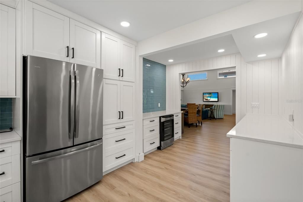 Chandelier, Interior, Kitchen, Pendant Lights, Recessed Lighting, Stainless Steel Appliances, Wood Texture Flooring